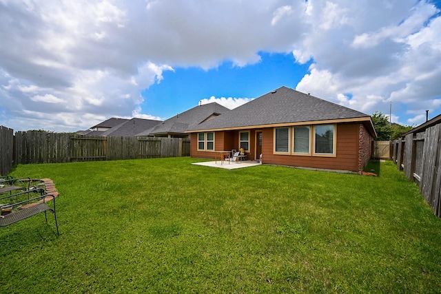 12207 Green City Ln, Houston, TX 77047 - rear view of house featuring a patio, roof with shingles, and a fenced backyard