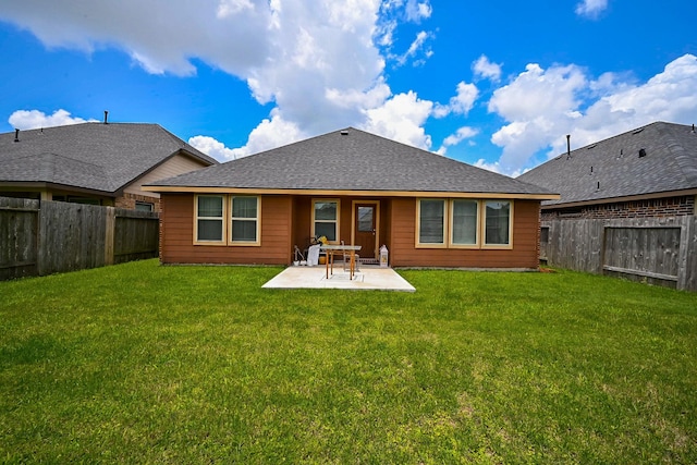 12207 Green City Ln, Houston, TX 77047 - back of property with a fenced backyard, a patio area, and a shingled roof