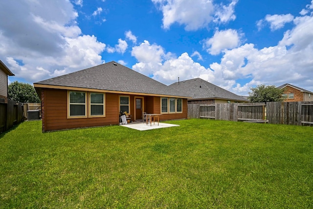 12207 Green City Ln, Houston, TX 77047 - rear view of house with a patio area, a fenced backyard, and a shingled roof