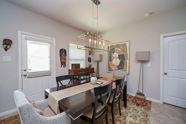 12207 Green City Ln, Houston, TX 77047 - dining space featuring a chandelier, a desk, and tile patterned flooring