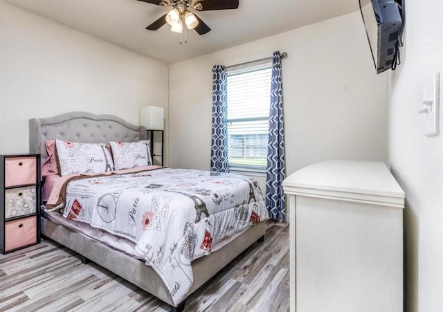 25706 Provender Pl, Katy, TX 77493 - bedroom with light wood-style floors and a ceiling fan