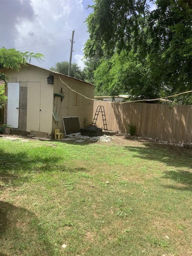 9406 Jolly Wood Ct, Houston, TX 77086 - view of yard featuring an outbuilding