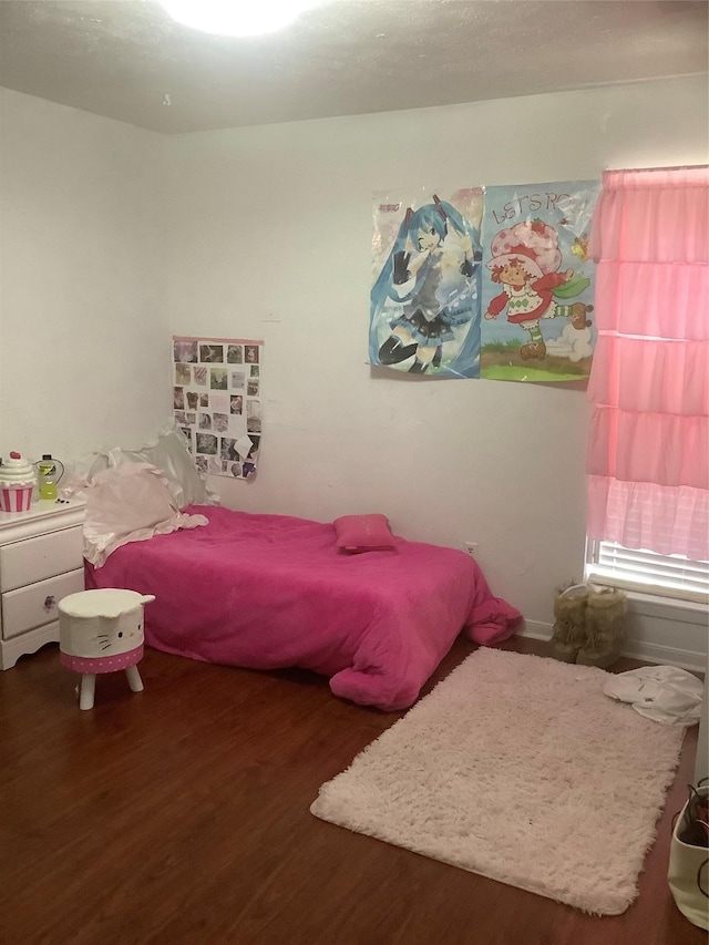 9406 Jolly Wood Ct, Houston, TX 77086 - bedroom with wood finished floors