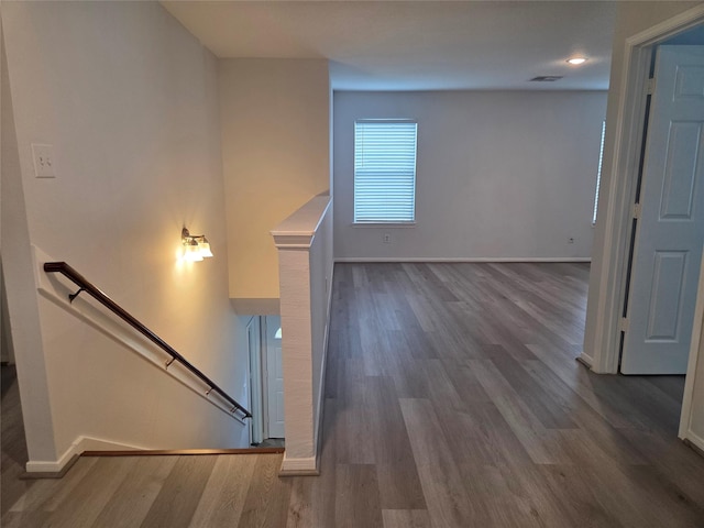 2703 Oakland Brook St, Houston, TX 77038 - hall featuring an upstairs landing and wood finished floors