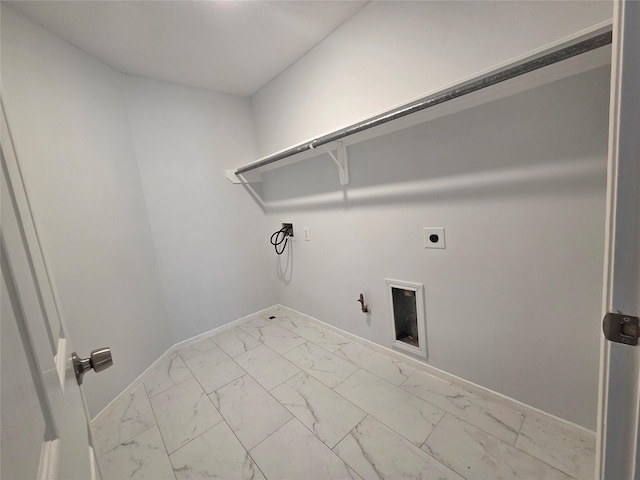 2703 Oakland Brook St, Houston, TX 77038 - laundry room with gas dryer hookup, hookup for an electric dryer, and light marble finish floors