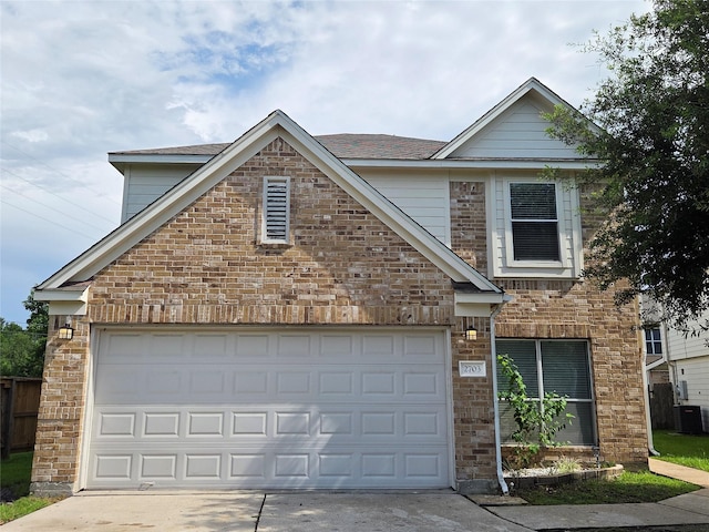 2703 Oakland Brook St, Houston, TX 77038 - traditional-style house featuring concrete driveway, brick siding, and a garage