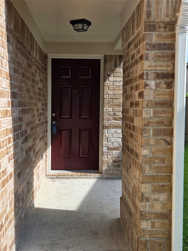 2703 Oakland Brook St, Houston, TX 77038 - view of exterior entry featuring brick siding