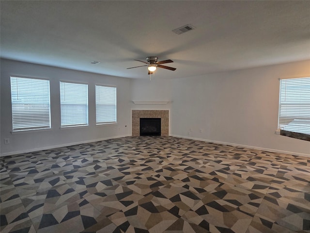 2703 Oakland Brook St, Houston, TX 77038 - unfurnished living room with ceiling fan, healthy amount of natural light, and a fireplace