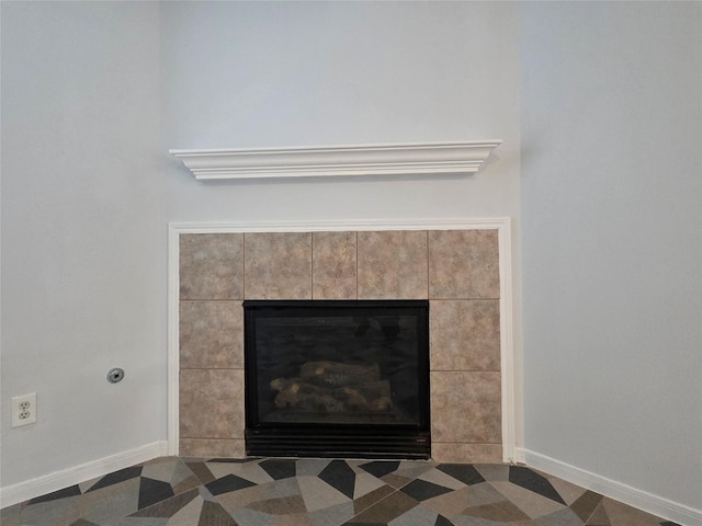 2703 Oakland Brook St, Houston, TX 77038 - detailed view of baseboards and a tiled fireplace