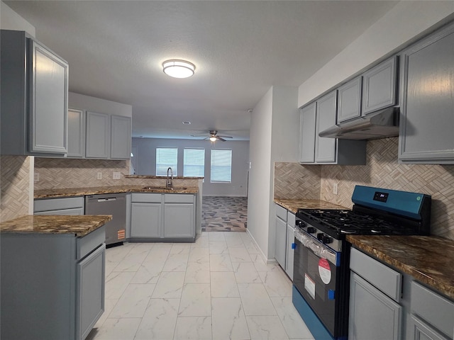 2703 Oakland Brook St, Houston, TX 77038 - kitchen featuring stainless steel appliances, gray cabinets, and light marble finish floors