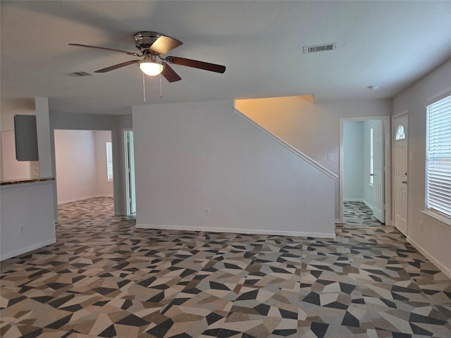2703 Oakland Brook St, Houston, TX 77038 - spare room featuring a ceiling fan and plenty of natural light