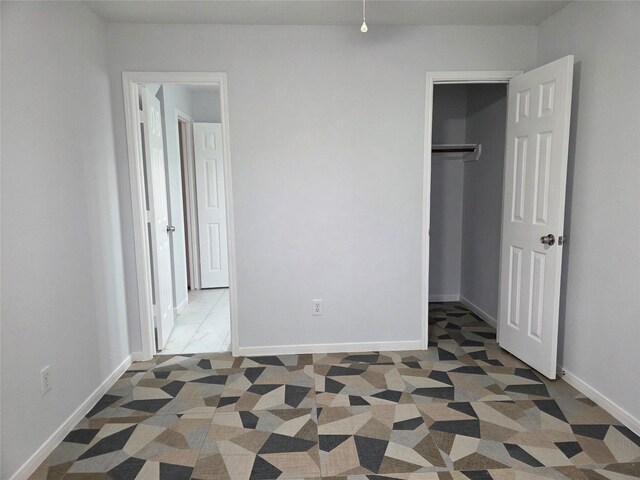 2703 Oakland Brook St, Houston, TX 77038 - unfurnished bedroom featuring a closet and baseboards
