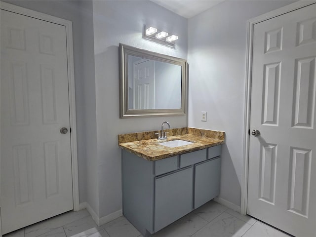 2703 Oakland Brook St, Houston, TX 77038 - bathroom featuring marble look tiles and vanity