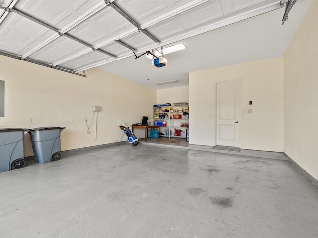 6922 Carolina Cherry Ln, Spring, TX 77389 - garage featuring a garage door opener and electric panel