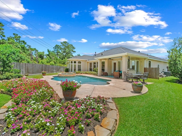 6922 Carolina Cherry Ln, Spring, TX 77389 - view of pool with ceiling fan, a patio area, a fenced backyard, and a pool with connected hot tub