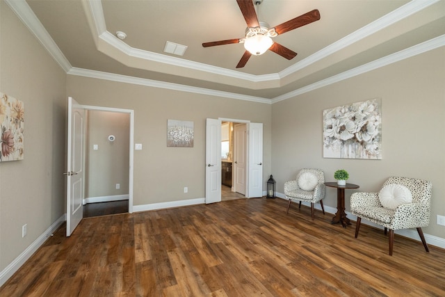 27619 Dalton Bluff Ct, Katy, TX 77494 - sitting room featuring a tray ceiling, wood finished floors, ceiling fan, and ornamental molding