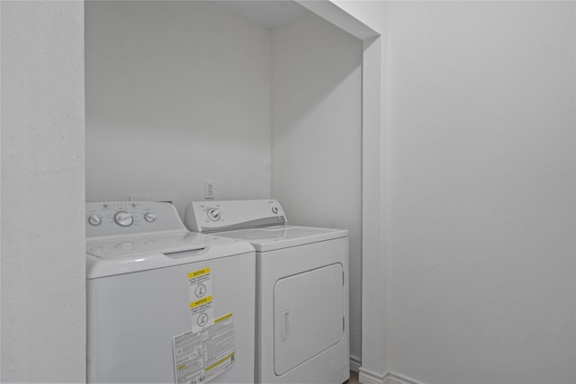 11011 Bandlon Dr, Houston, TX 77072 - laundry room with washing machine and clothes dryer