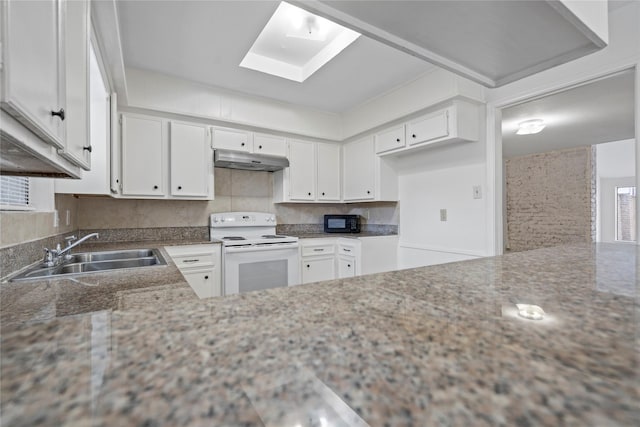 11011 Bandlon Dr, Houston, TX 77072 - kitchen with white range with electric cooktop, under cabinet range hood, backsplash, white cabinetry, and black microwave