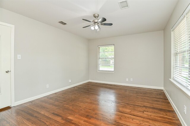 4502 Sanford Rd, Houston, TX 77035 - empty room with dark wood finished floors and ceiling fan