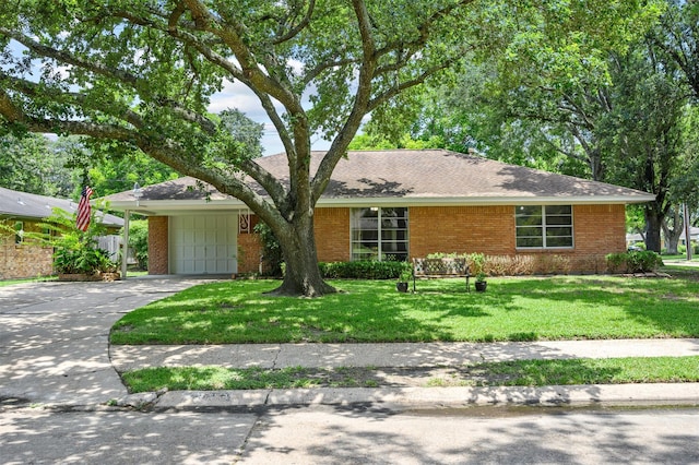 4502 Sanford Rd, Houston, TX 77035 - single story home with brick siding, a garage, concrete driveway, a front yard, and a shingled roof