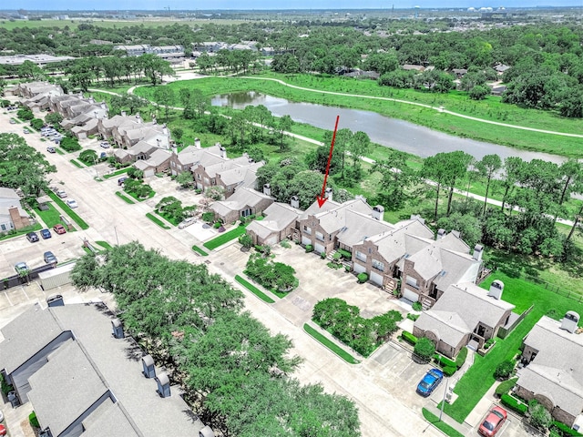 16160 Seahorse Dr, Houston, TX 77062 - aerial view of residential area featuring a large body of water and a tree filled landscape