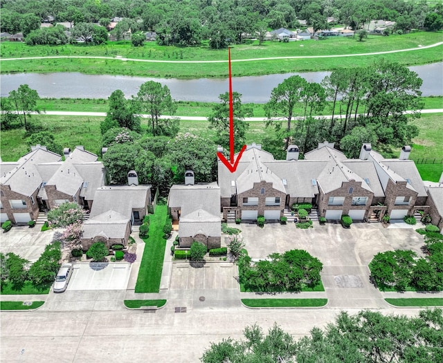16160 Seahorse Dr, Houston, TX 77062 - aerial view of residential area with a nearby body of water and a tree filled landscape
