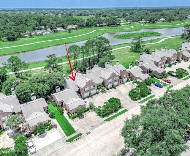 16160 Seahorse Dr, Houston, TX 77062 - aerial view of residential area featuring a large body of water and a tree filled landscape
