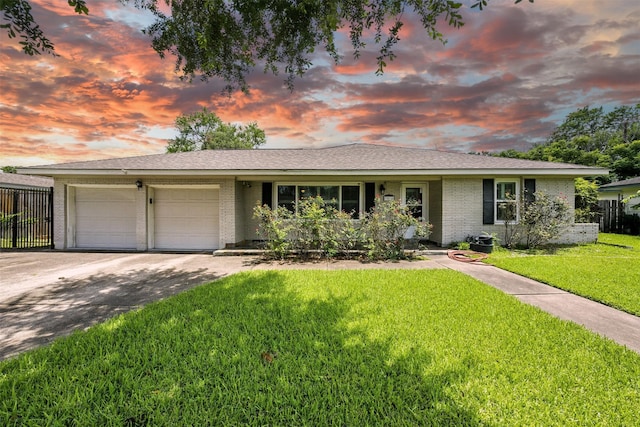 3014 Castlewood St, Houston, TX 77025 - ranch-style house featuring an attached garage, brick siding, and driveway