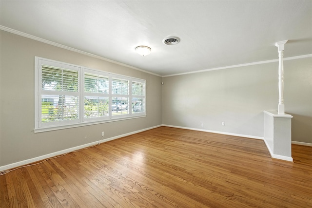 3014 Castlewood St, Houston, TX 77025 - spare room featuring ornamental molding and light wood-style flooring