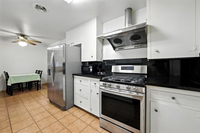 3014 Castlewood St, Houston, TX 77025 - kitchen featuring appliances with stainless steel finishes, exhaust hood, white cabinetry, a ceiling fan, and dark countertops
