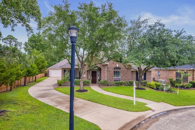 15542 Stoneridge Park Ln, Cypress, TX 77429 - view of front facade with brick siding and a detached garage