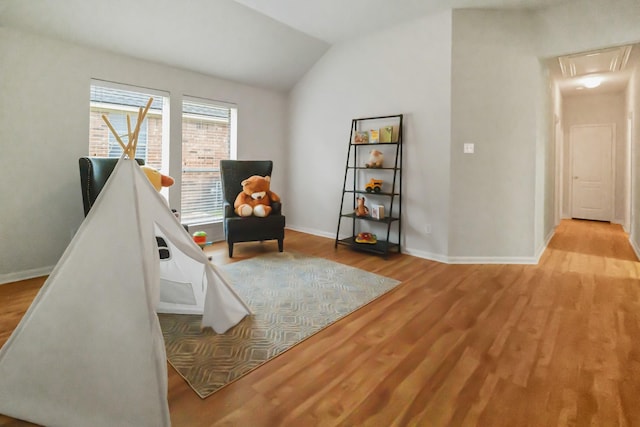 15542 Stoneridge Park Ln, Cypress, TX 77429 - playroom with wood finished floors, vaulted ceiling, and attic access