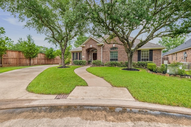 15542 Stoneridge Park Ln, Cypress, TX 77429 - traditional home with brick siding and roof with shingles