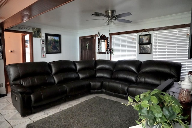 8606 S Friendship Rd, Houston, TX 77080 - living room with light tile patterned flooring, a ceiling fan, and crown molding