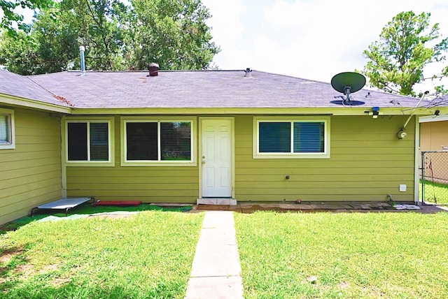 8606 S Friendship Rd, Houston, TX 77080 - rear view of house featuring a shingled roof