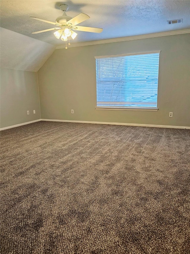 7715 Lobera Dr, Houston, TX 77083 - bonus room featuring a textured ceiling, ceiling fan, carpet flooring, and vaulted ceiling
