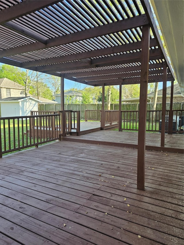 7715 Lobera Dr, Houston, TX 77083 - deck with a pergola, a fenced backyard, and a storage shed