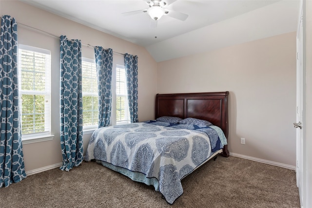 6605 Fallen Breeze Ln, Dickinson, TX 77539 - bedroom featuring carpet floors, multiple windows, vaulted ceiling, and a ceiling fan