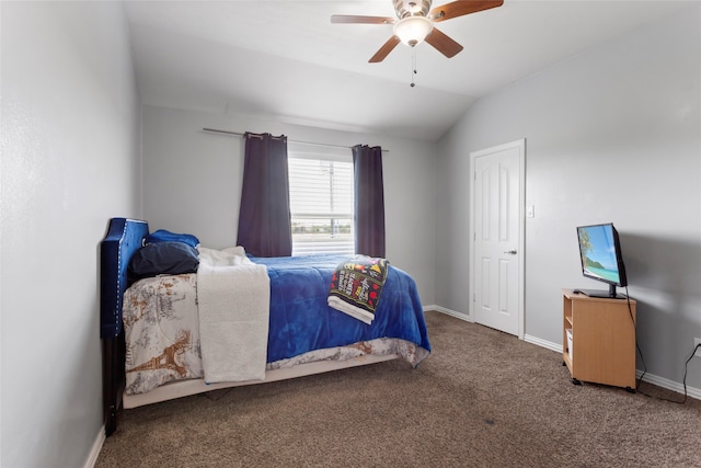 6605 Fallen Breeze Ln, Dickinson, TX 77539 - carpeted bedroom with vaulted ceiling and a ceiling fan