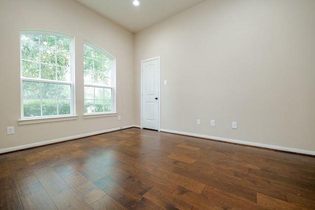 9335 Mystic Falls Ln, Humble, TX 77396 - unfurnished room featuring dark wood-style floors and recessed lighting