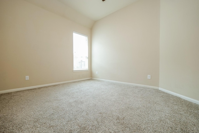 9335 Mystic Falls Ln, Humble, TX 77396 - unfurnished room featuring carpet and lofted ceiling