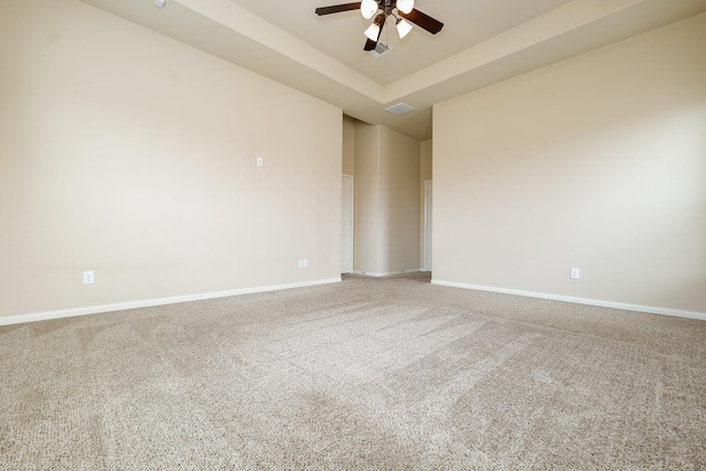 9335 Mystic Falls Ln, Humble, TX 77396 - unfurnished room with ceiling fan, carpet floors, and a raised ceiling