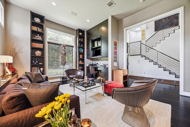 2409 Maconda Ln, Houston, TX 77027 - living room with stairway, wood finished floors, recessed lighting, and built in shelves