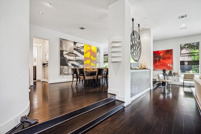 2409 Maconda Ln, Houston, TX 77027 - dining area with wood finished floors and recessed lighting