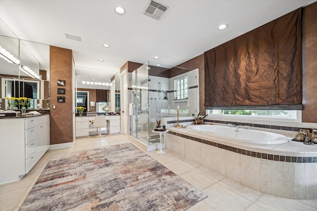 2409 Maconda Ln, Houston, TX 77027 - bathroom with tile patterned floors, vanity, a garden tub, a stall shower, and recessed lighting