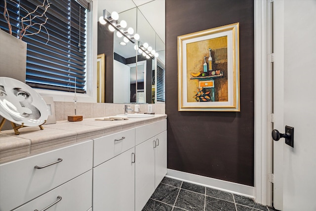 2409 Maconda Ln, Houston, TX 77027 - bathroom with vanity and tile patterned floors