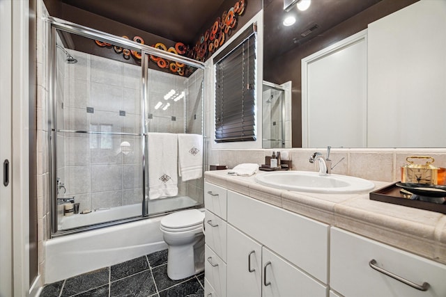2409 Maconda Ln, Houston, TX 77027 - bathroom featuring enclosed tub / shower combo and vanity