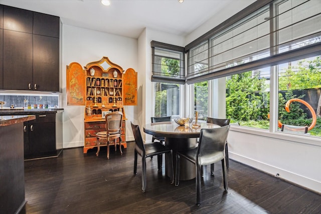 2409 Maconda Ln, Houston, TX 77027 - dining room with dark wood finished floors and recessed lighting