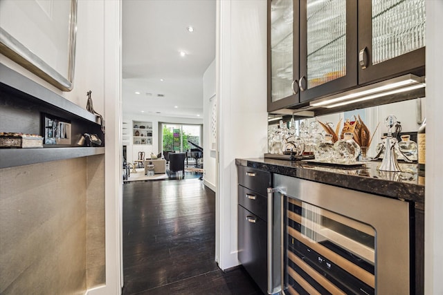 2409 Maconda Ln, Houston, TX 77027 - indoor bar with wine cooler, dark wood-type flooring, and recessed lighting
