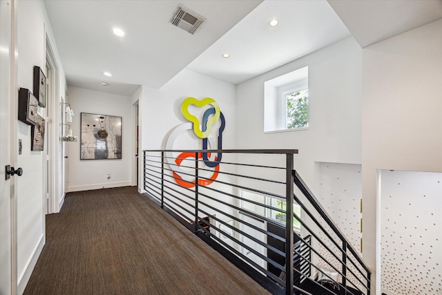 2409 Maconda Ln, Houston, TX 77027 - hallway with recessed lighting, an upstairs landing, and carpet flooring